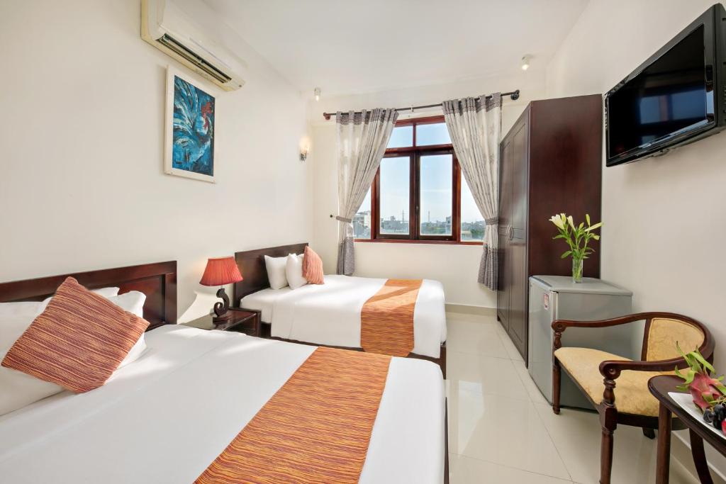Двухместный (Улучшенный двухместный номер с 2 отдельными кроватями) отеля Dreams Hotel, Дананг