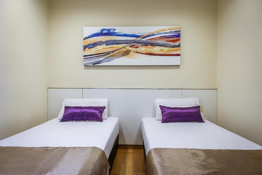 Двухместный (Стандартный двухместный номер с 2 отдельными кроватями) отеля Hotel 81 Cosy, Сингапур (город)