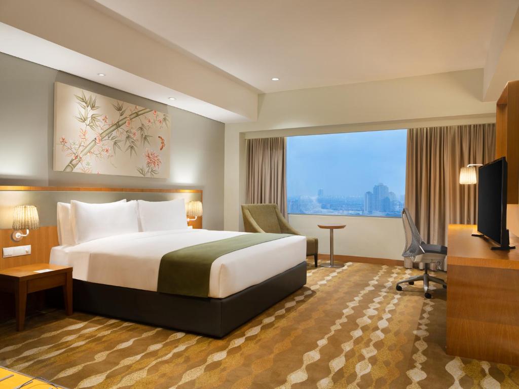 Сьюит (Суперлюкс с 1 спальней - для некурящих) отеля Holiday Inn & Suites Jakarta Gajah Mada, Джакарта