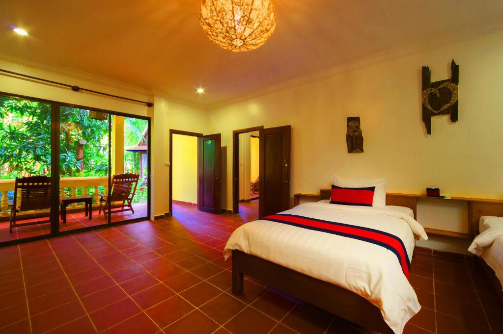 Двухместный (Interconnecting Room - Free Pick Up & City Center Shuttle) отеля Le Jardin d'Angkor Hotel & Resort, Сием Рип
