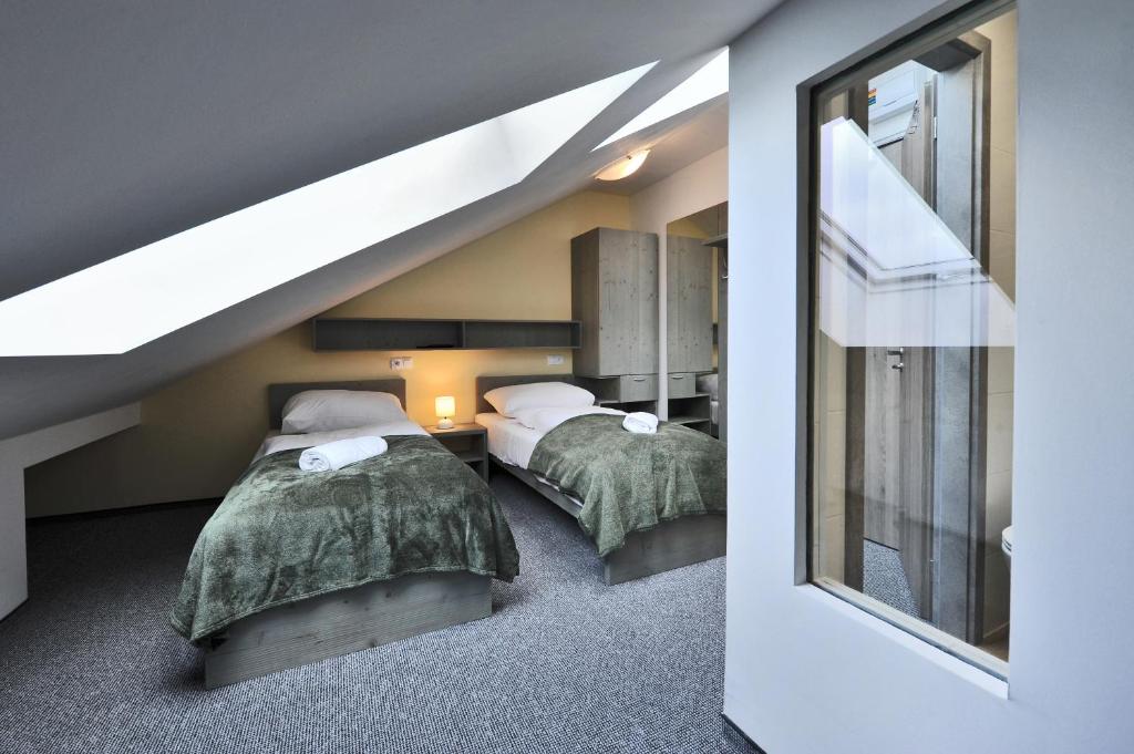 Двухместный (Двухместный номер эконом-класса с 1 кроватью или 2 отдельными кроватями) апарт-отеля Aparthotel Belveder, Татранска-Ломница