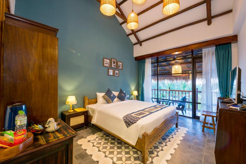 Двухместный (Двухместный номер Делюкс с 1 кроватью или 2 отдельными кроватями, вид на сад) курортного отеля Zest Villas & Spa Hoi An, Хойан