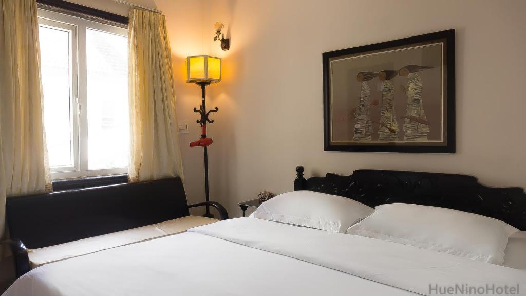 Двухместный (Улучшенный номер с кроватью размера «king-size») отеля Hue Nino Hotel, Хюэ