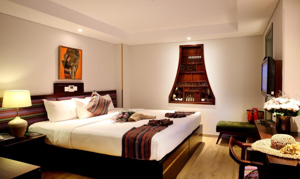Двухместный (Улучшенный двухместный номер с 1 кроватью или 2 отдельными кроватями) отеля Au Lac Hotel, Хошимин