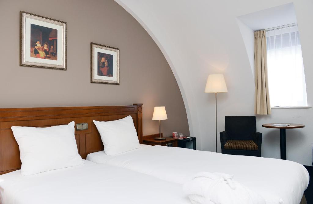 Двухместный (Двухместный номер Делюкс с 2 отдельными кроватями) отеля Amrâth Grand Hotel Frans Hals, Гарлем