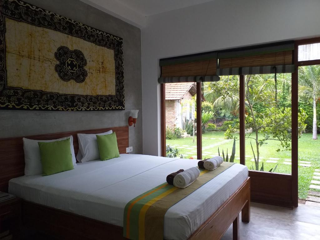 Двухместный (Deluxe Double with Garden & Canal View), Green Wood Villa Negombo