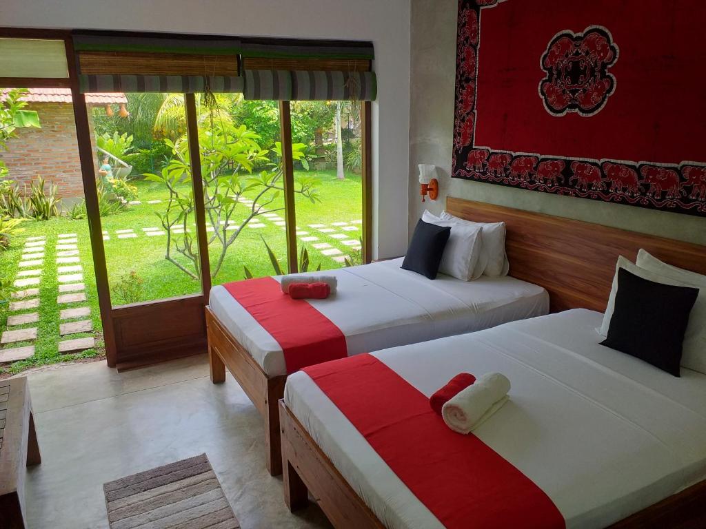 Двухместный (Deluxe Twin Room with Garden & Canal View) отеля Green Wood Villa Negombo, Негомбо
