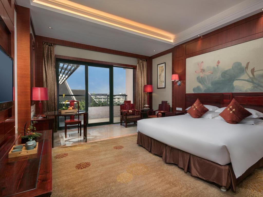 Двухместный (Улучшенный двухместный номер с 1 кроватью и видом на сад) отеля Hangzhou Blossom Water Museum Hotel, Ханчжоу