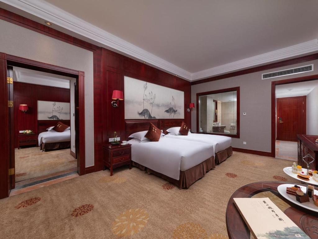 Сьюит (Семейный люкс) отеля Hangzhou Blossom Water Museum Hotel, Ханчжоу