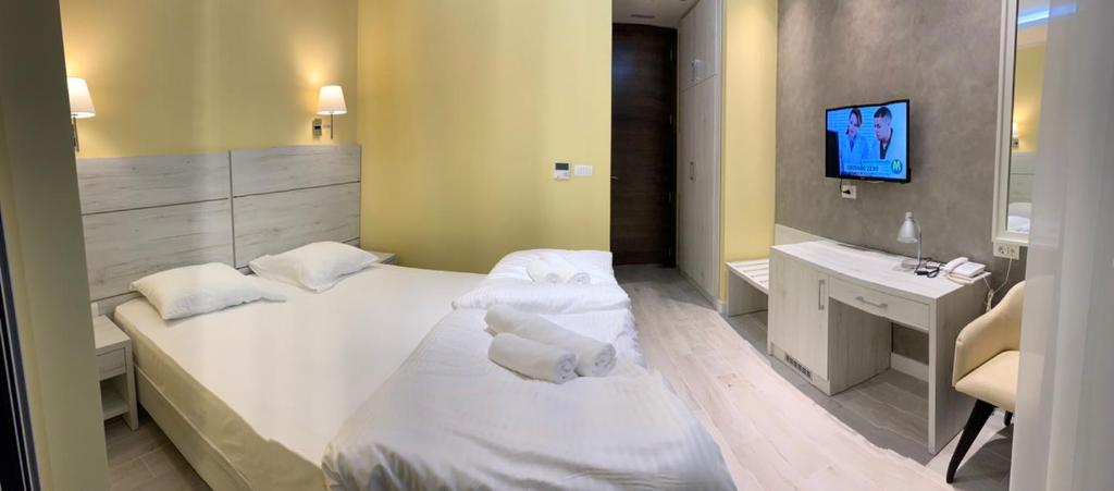 Двухместный (Двухместный номер с 1 кроватью или 2 отдельными кроватями и боковым видом на море) отеля Hotel Pierina, Будва