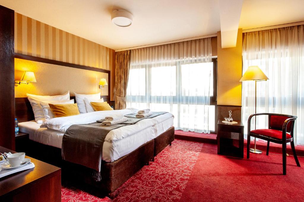 Двухместный (Улучшенный двухместный номер с 1 кроватью или 2 отдельными кроватями) отеля Hotel Wielopole, Краков