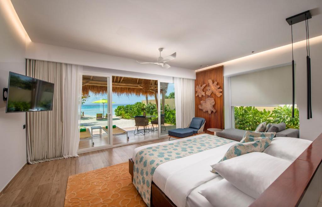 Двухместный (Вилла «Пляж») курортного отеля Emerald Maldives Resort & Spa-Platinum All Inclusive, Фасмендху