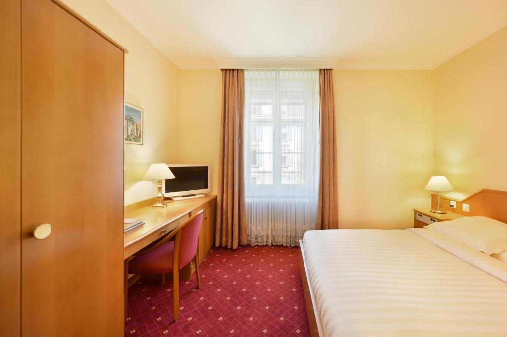 Двухместный (Двухместный номер с 1 кроватью или 2 отдельными кроватями) отеля Elite, Лозанна