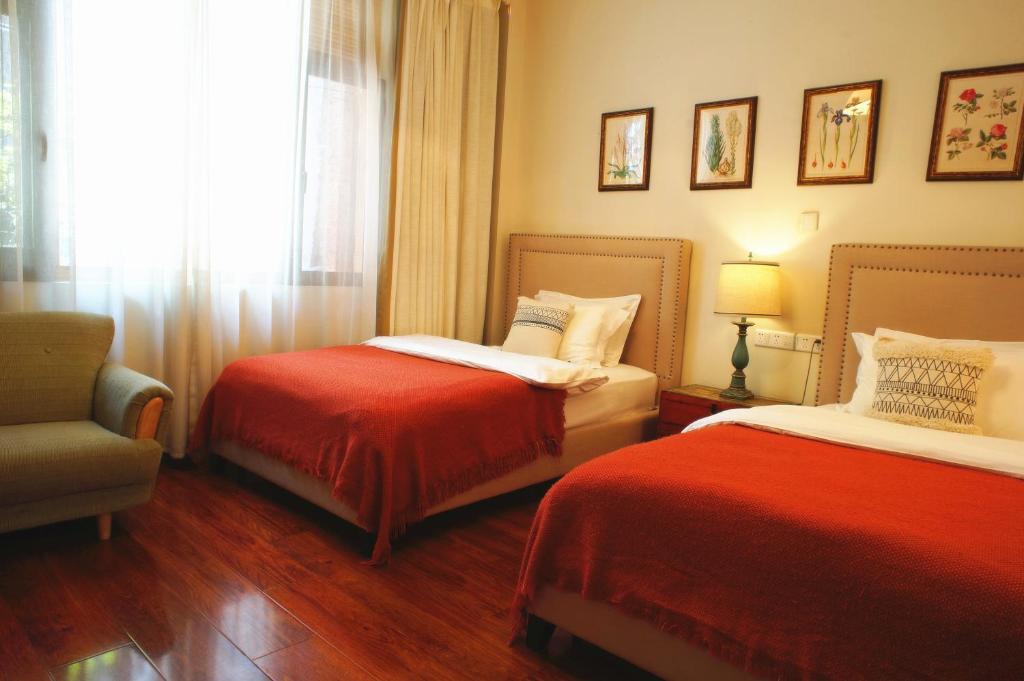 Двухместный (Двухместный номер с 2 отдельными кроватями) гостевого дома Dali Yunxi Boutique Inn, Дали