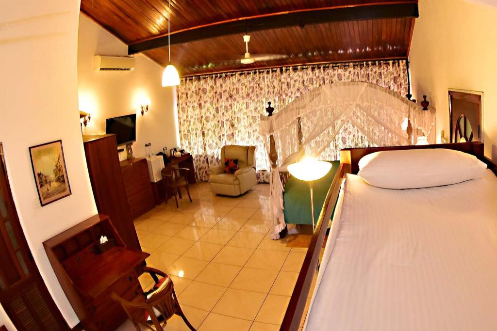 Трехместный (Grand Luxary Family room with Bathtub), Colombo Villa at Cambridge Place