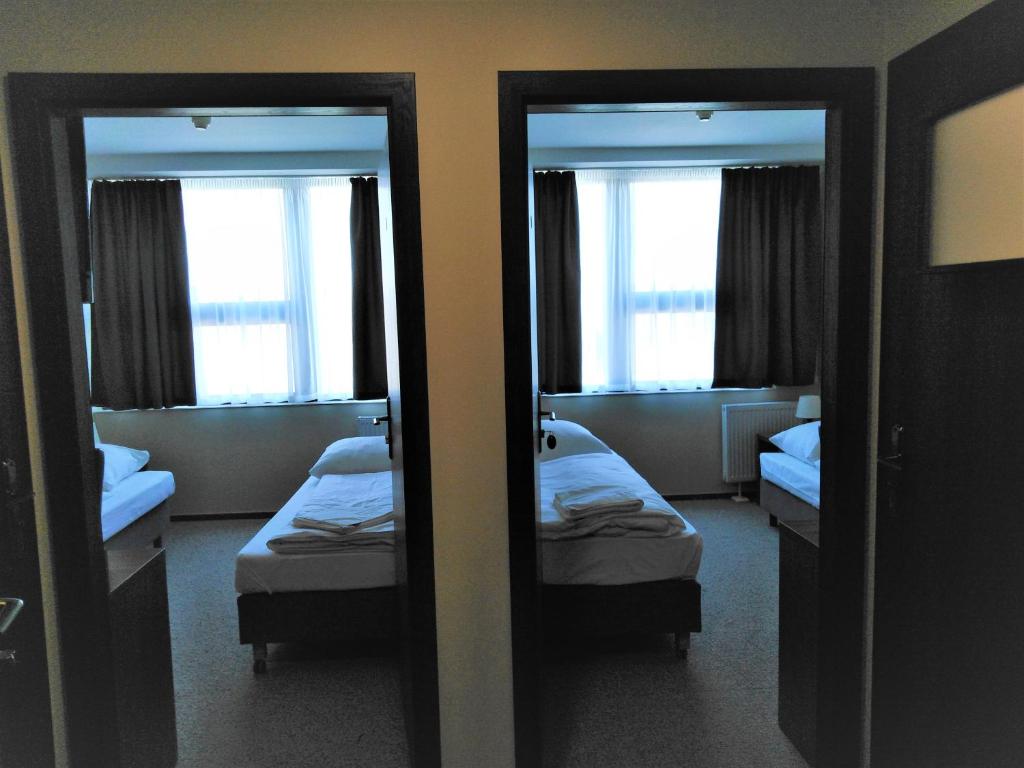 Четырехместный (Четырехместный номер Делюкс) отеля Hotel Cargo, Слубице