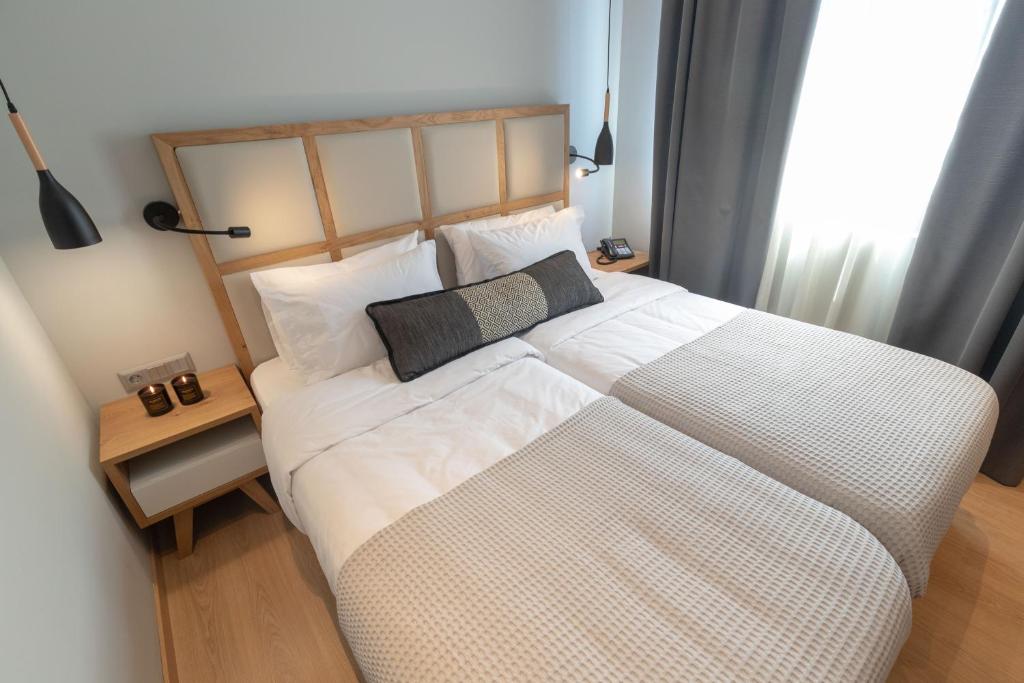 Двухместный (Стандартный двухместный номер с 1 кроватью или 2 отдельными кроватями) отеля Grand Port Suites, Салоники