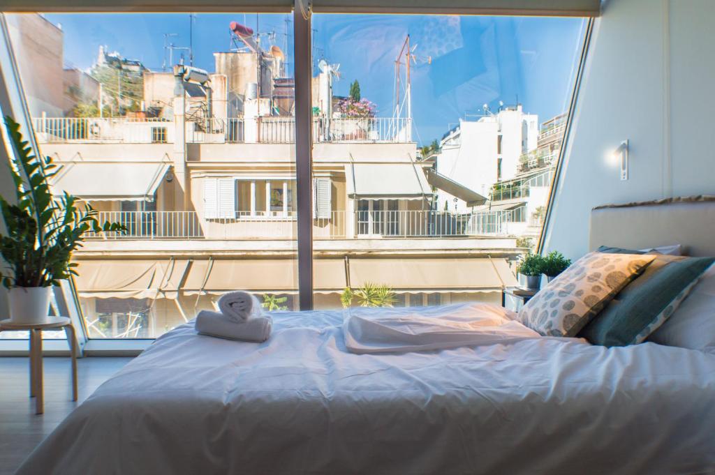 Двухместный (Двухместный номер с двуспальной кроватью и дополнительной кроватью) апарт-отеля Greek Gastronomy Center Apartments, Афины