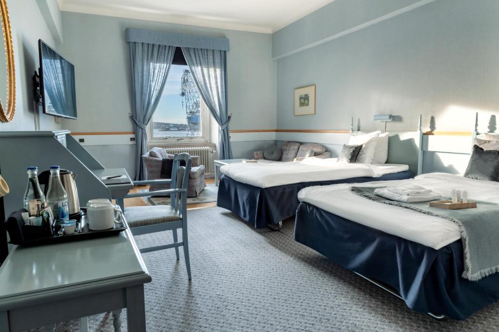 Двухместный (Улучшенный двухместный номер с 2 отдельными кроватями и видом на море) отеля First Hotel Statt, Эрншельдсвик