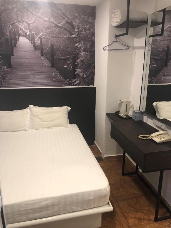 Двухместный (Двухместный номер Делюкс с 1 кроватью) отеля The Amazing Inn, Сингапур (город)