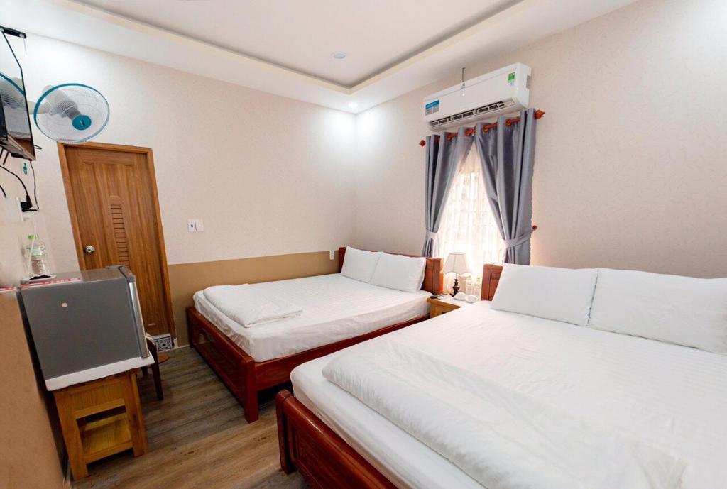 Двухместный (Двухместный номер с 2 отдельными кроватями и окном) отеля Khách sạn Golf Star Hotel, Кондао