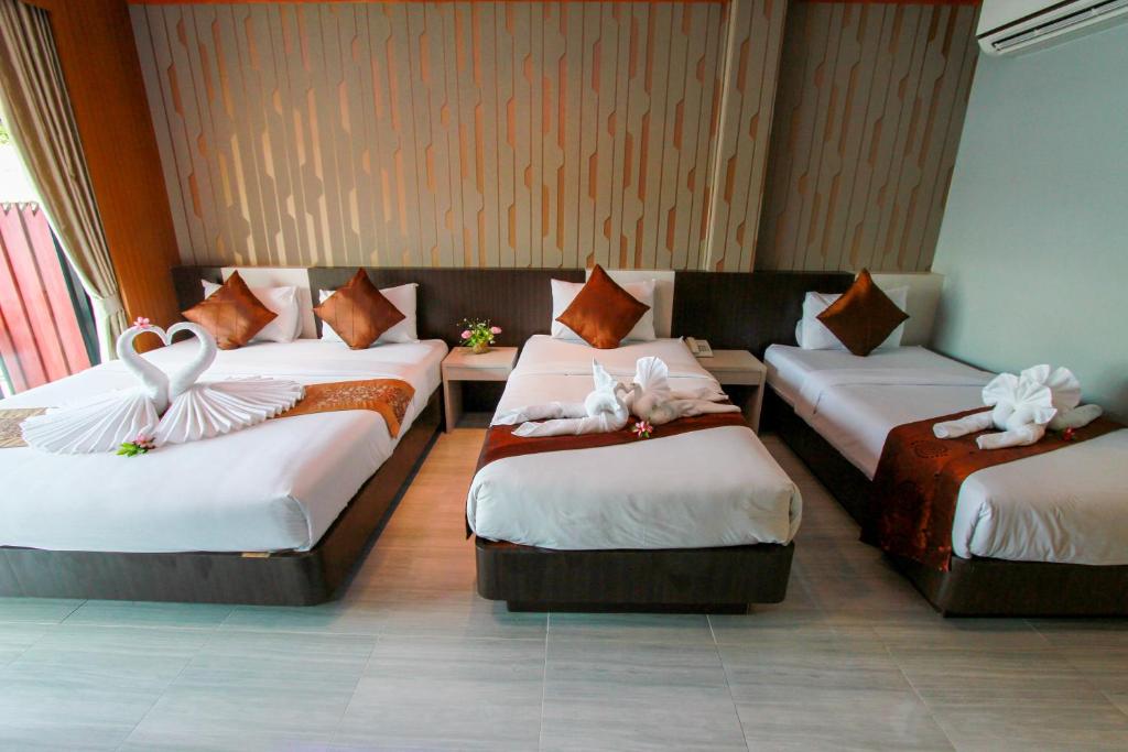 Трехместный (Трехместный номер Делюкс) курортного отеля Coco Bella Resort, Пхи-Пхи