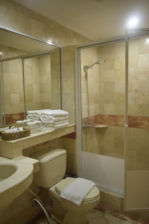 Двухместный (Стандартный двухместный номер с 2 отдельными кроватями) отеля Orchid Garden Suites, Манила