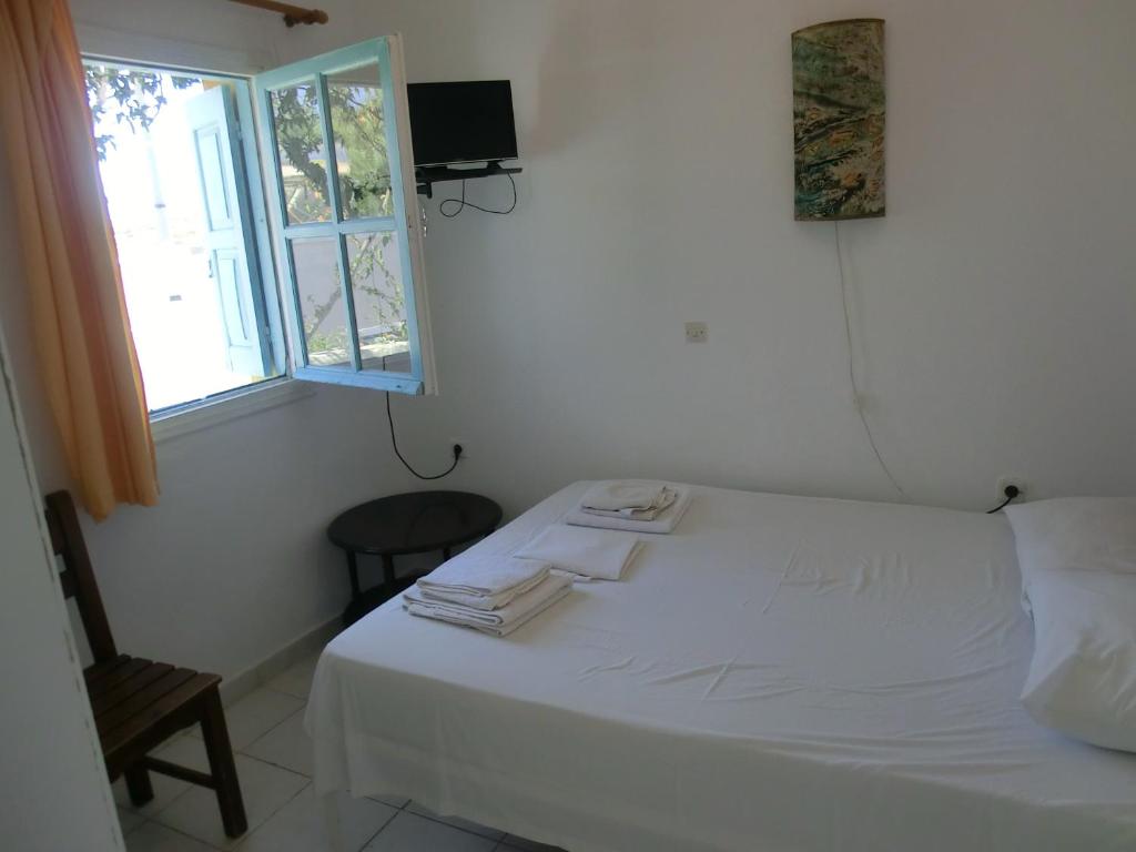 Четырехместный (Четырехместный номер эконом-класса) хостела Santorini Hostel, Тира