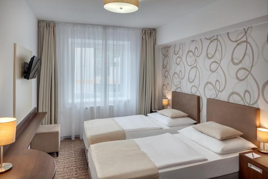 Двухместный (Двухместный номер с 1 кроватью или 2 отдельными кроватями) отеля Atlas, Бенешов