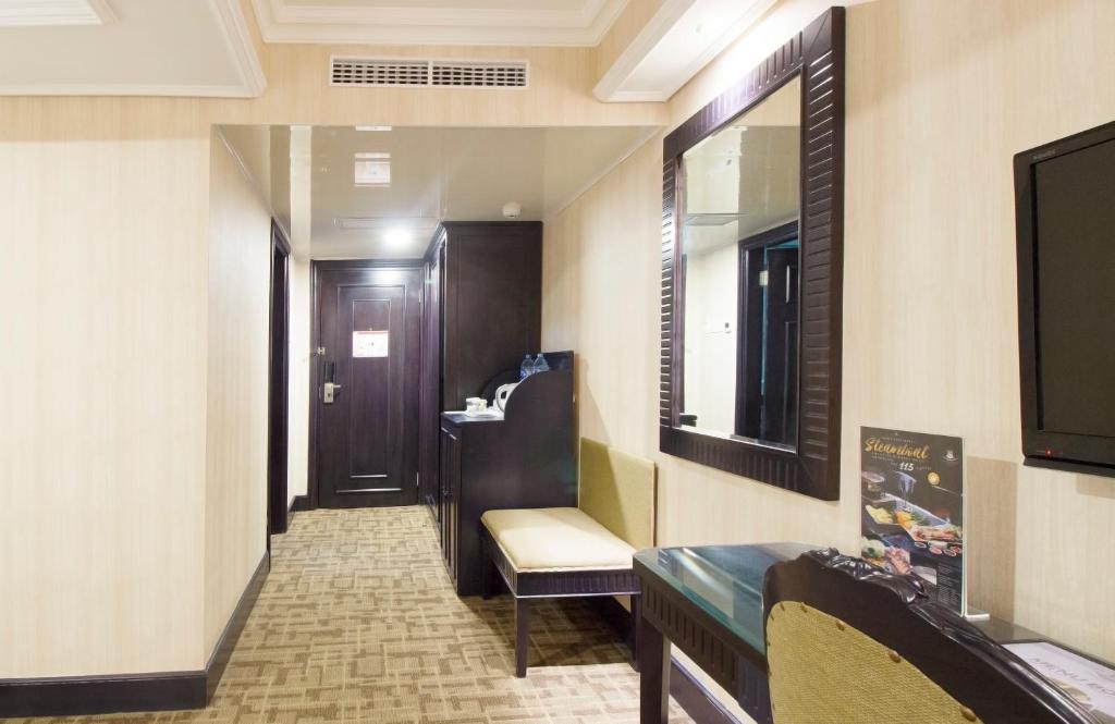 Двухместный (Двухместный номер Делюкс с 1 кроватью или 2 отдельными кроватями) отеля Golden Boutique Hotel Melawai, Джакарта