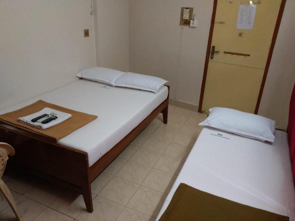 Двухместный (Двухместный номер Делюкс с 1 кроватью и дополнительной кроватью) отеля Anandan Tourist Home, Варкала