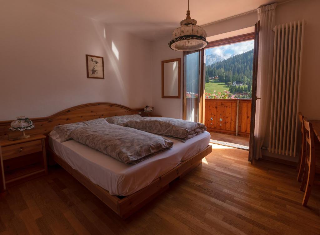 Двухместный (Классический двухместный номер с 1 кроватью) отеля Dolomiti Hotel Cozzio, Мадонна-ди-Кампильо