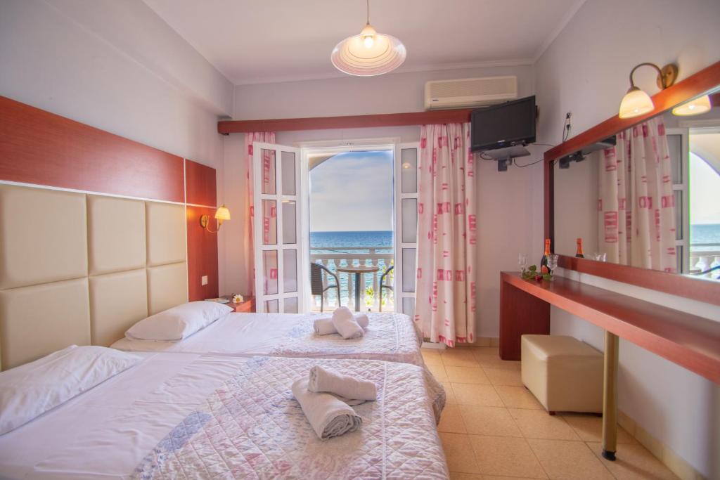 Студио (Стандартный двухместный номер-студио с 1 кроватью или 2 отдельными кроватями, вид на море) апарт-отеля Agoulos Beach Hotel, Аргасион