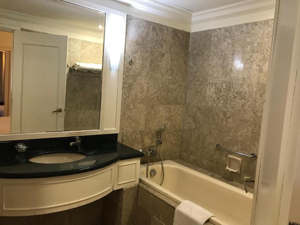 Апартаменты (Family 2-Bedroom Suite), Queens Service Suite @ Times Square