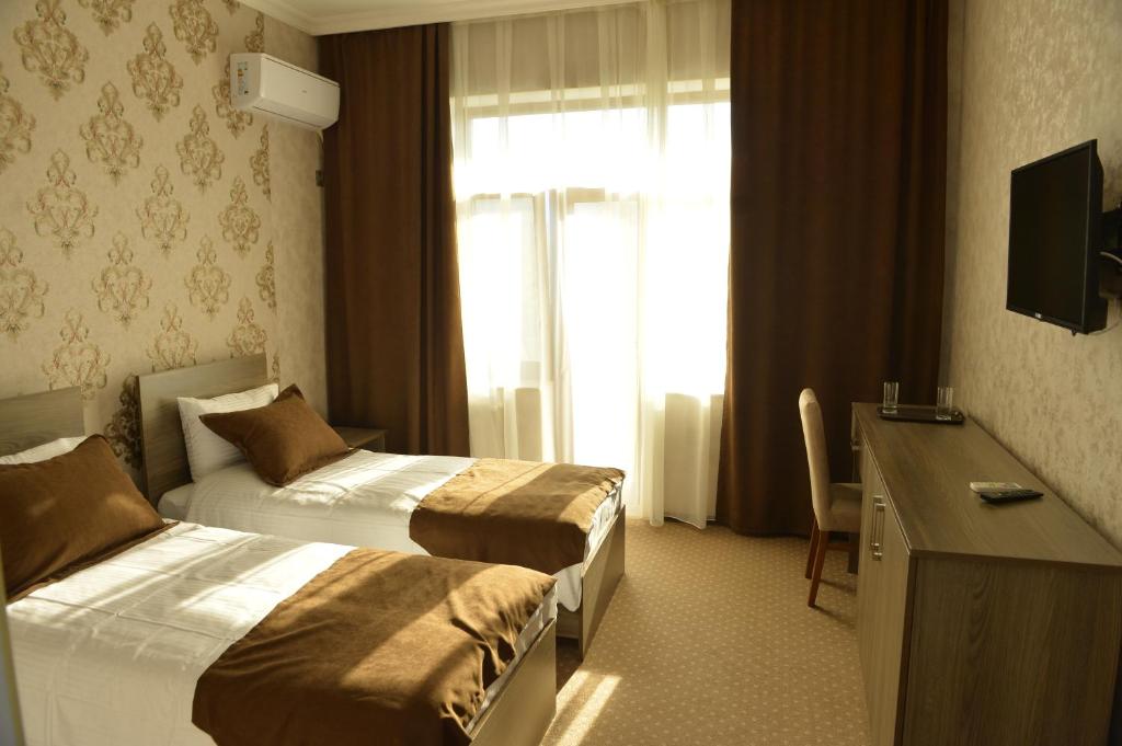 Двухместный (Бюджетный двухместный номер с 2 отдельными кроватями) отеля Hirkan Park Hotel, Ленкорань