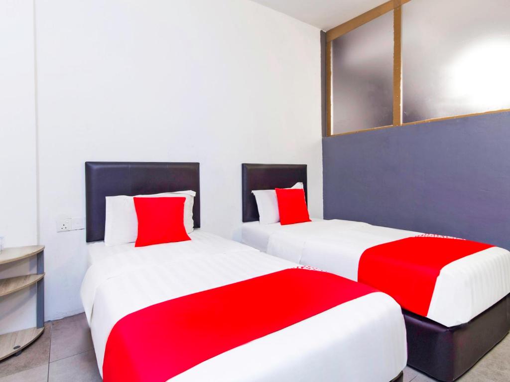 Двухместный (Стандартный двухместный номер с 2 отдельными кроватями) отеля OYO 251 Intime Hotel, Куала-Лумпур