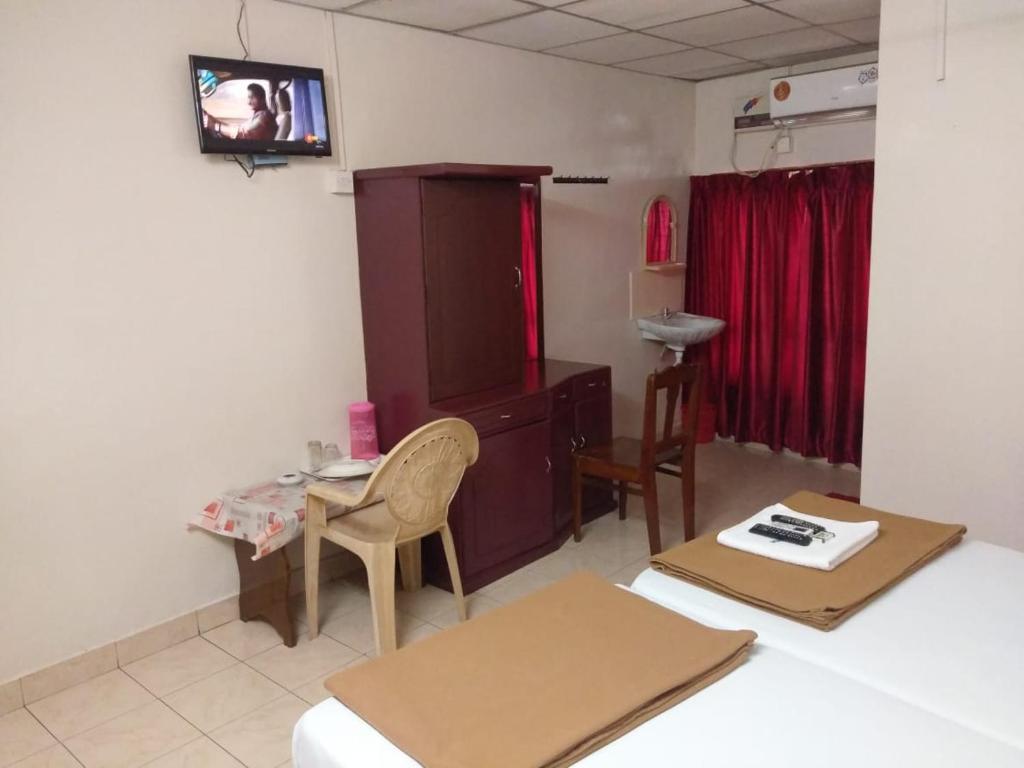 Двухместный (Улучшенный двухместный номер с 1 кроватью) отеля Anandan Tourist Home, Варкала