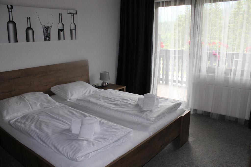 Двухместный (Двухместный номер Делюкс с 1 кроватью (для 2 взрослых и 1 ребенка)) отеля Gasthof Draxlerhaus, Хоэнтауэрн