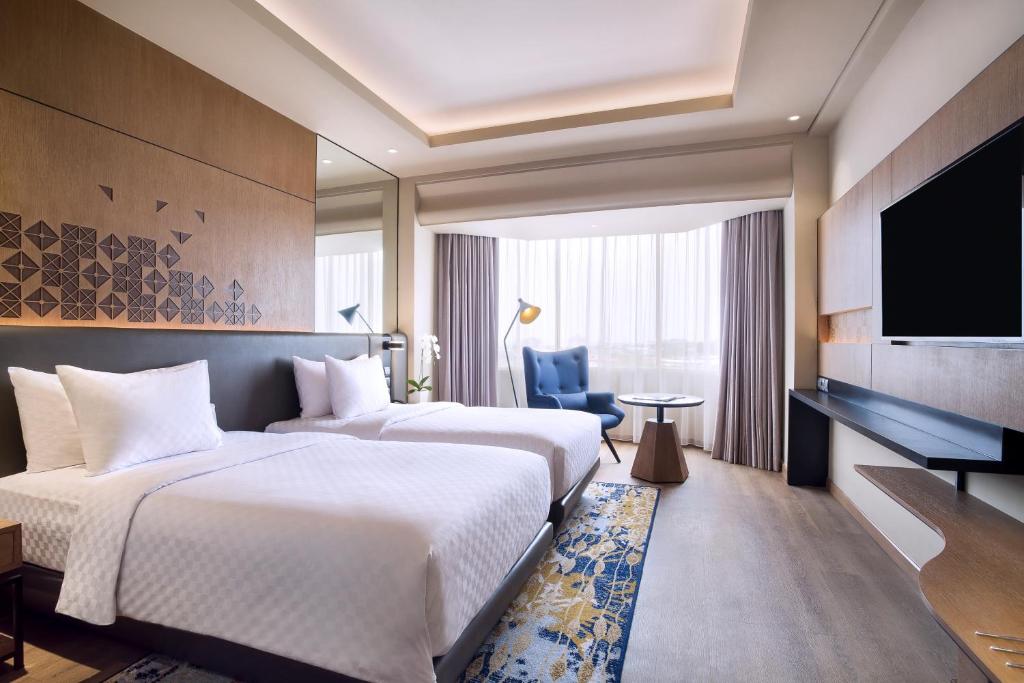 Двухместный (Улучшенный двухместный номер с 2 отдельными кроватями) отеля Mercure Jakarta Batavia, Джакарта