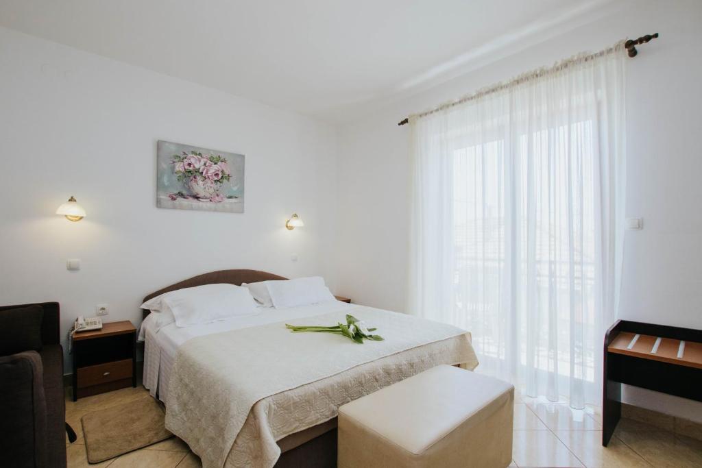 Двухместный (Стандартный двухместный номер с 1 кроватью или 2 отдельными кроватями и балконом) отеля Hotel Vila Tina, Трогир