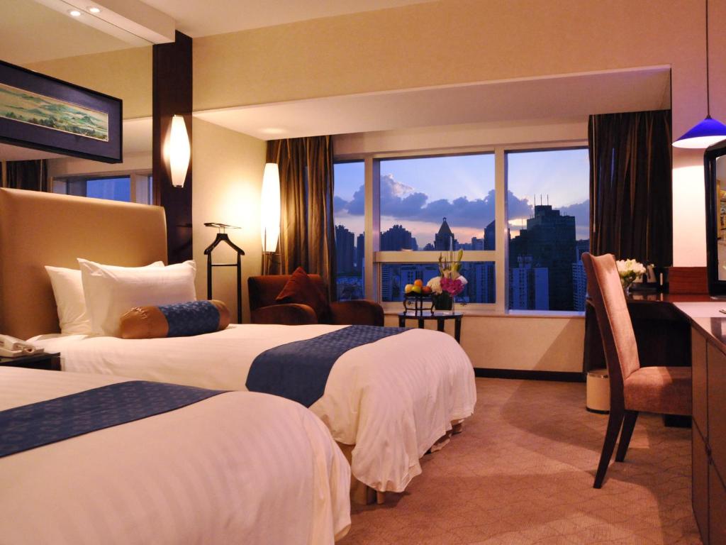 Двухместный (Двухместный номер Делюкс с 1 кроватью или 2 отдельными кроватями) отеля Shanghai Grand Trustel Purple Mountain Hotel, Шанхай