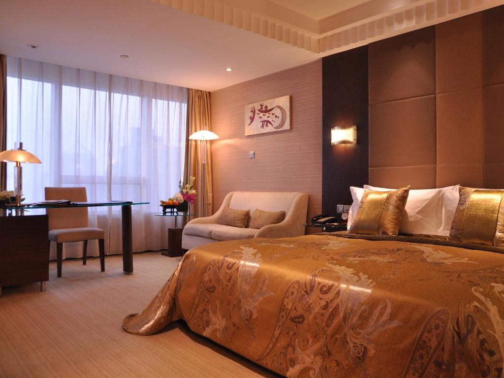 Двухместный (Представительский двухместный номер с 1 кроватью или 2 отдельными кроватями) отеля Shanghai Grand Trustel Purple Mountain Hotel, Шанхай