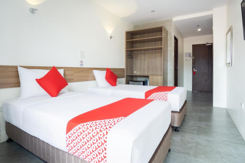 Двухместный (Двухместный номер Делюкс с 2 отдельными кроватями) отеля 18 Suites Cebu, Себу