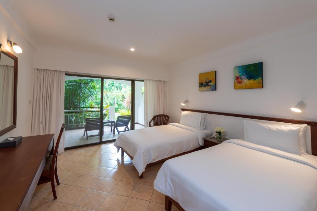 Двухместный (Стандартный двухместный номер с 1 кроватью или 2 отдельными кроватями) курортного отеля Pinnacle Grand Jomtien Resort, Паттайя