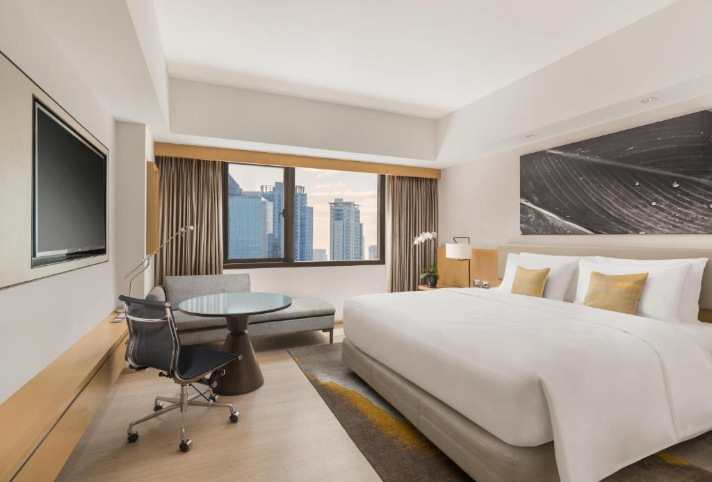 Двухместный (Улучшенный двухместный номер Делюкс с 1 кроватью или 2 отдельными кроватями) отеля Seda Bonifacio Global City, Манила