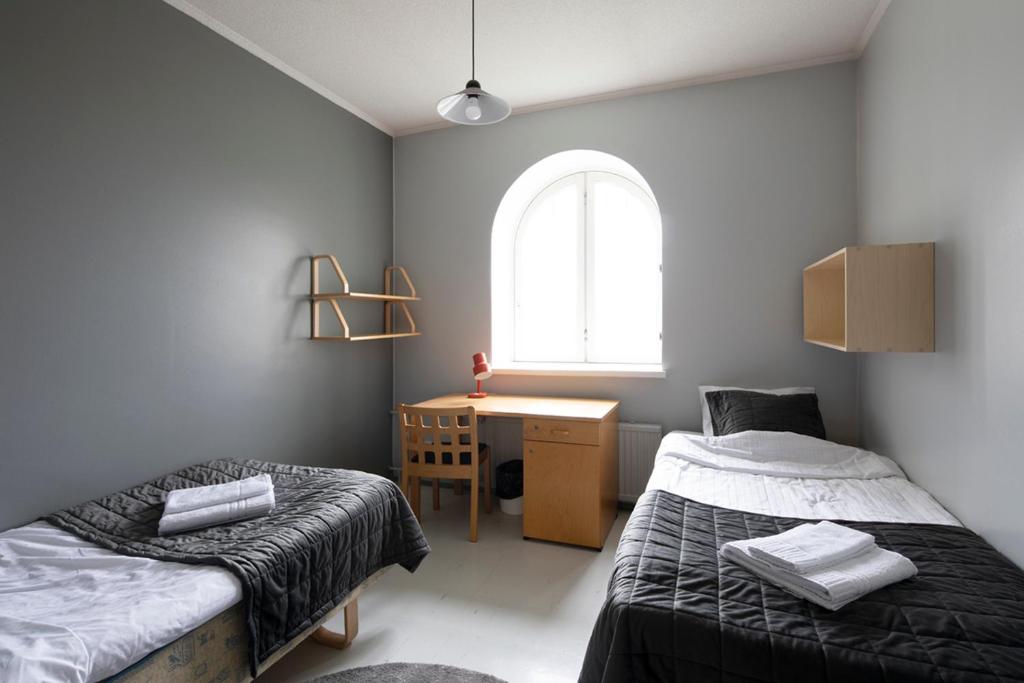 Двухместный (Стандартный двухместный номер с 1 кроватью или 2 отдельными кроватями) хостела Opiston Kunkku, Лахти