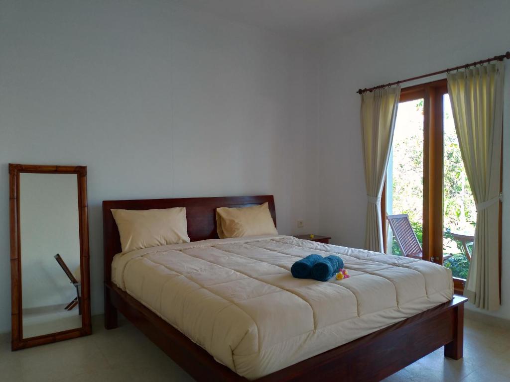 Двухместный (Улучшенный двухместный номер с 1 кроватью) семейного отеля Lala Homestay Bingin, Улувату