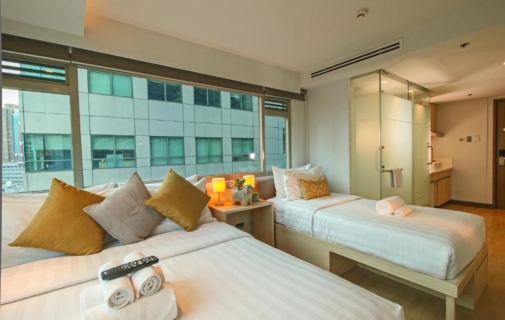 Двухместный (Двухместный номер Делюкс с 1 кроватью) отеля The Mini Suites - Eton Tower Makati, Манила
