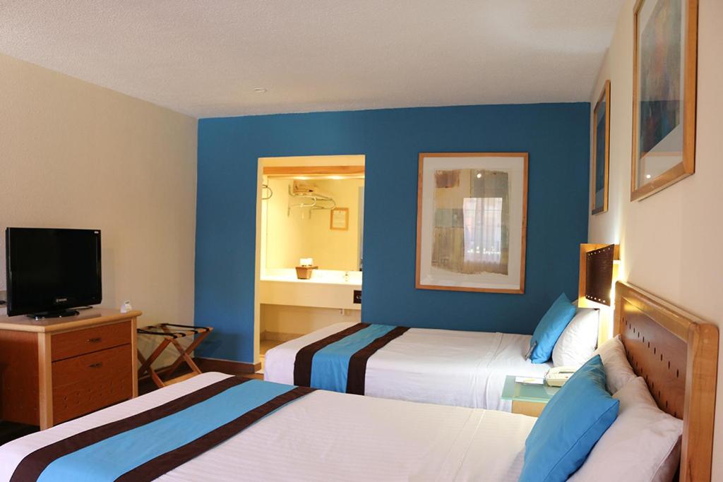 Четырехместный (Двухместный номер с 2 двуспальными кроватями) отеля Hotel Colonial Ciudad Juarez, Сьюдад-Хуарес