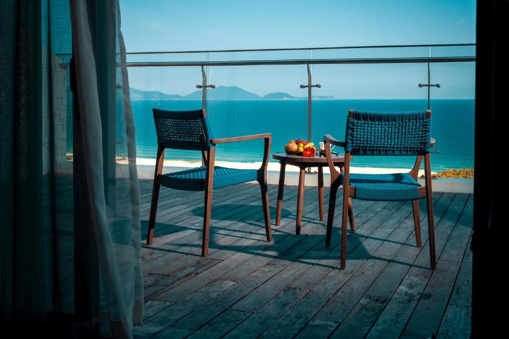 Двухместный (Номер Делюкс с террасой и видом на океан) курортного отеля Duyen Ha Resort Cam Ranh, Камрань